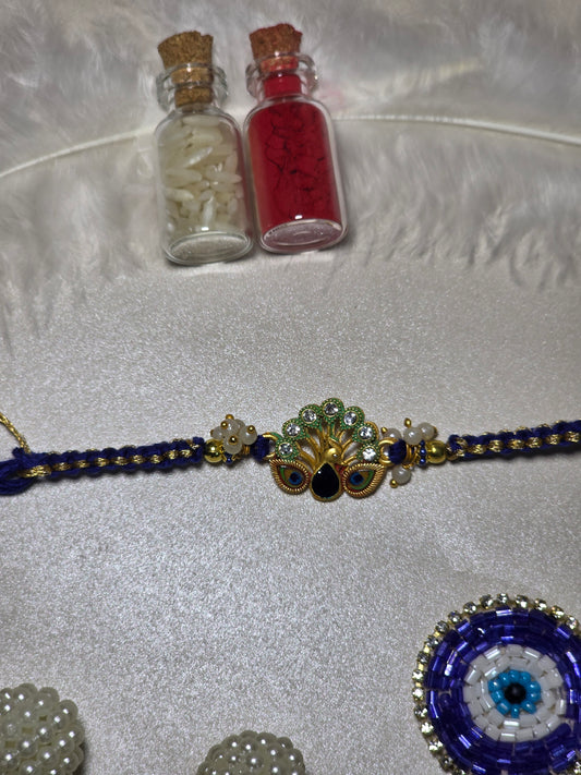 Mayur Rajsi Rakhi (with Kumkum & Chawal)