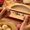 Mayur Pushp Pearl Rakhi