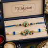 Meher Floral & Mor Krishna Pearl Bhaiya Bhabhi Rakhi Pack of 2